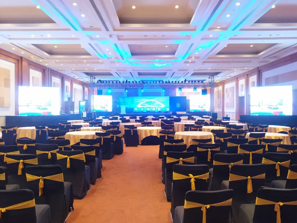 Grand banquet hall arranged for corporate conferences and events at ExpoInn Suites and Conventions, a luxury hotel in Greater Noida