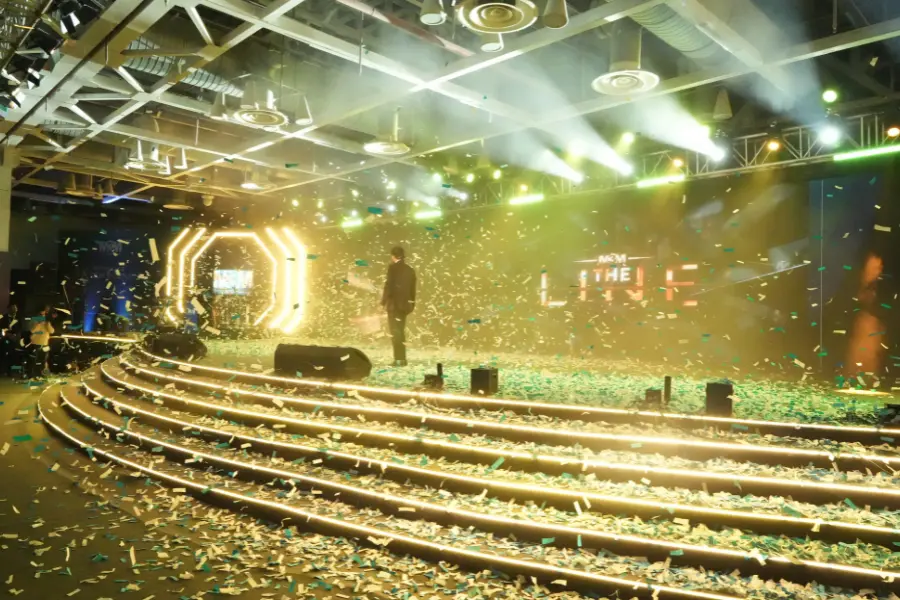 Grand event at ExpoInn with a large hall, elegant décor, and extensive seating arrangements